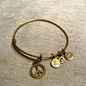 Alex & Ani peace symbol gold tone bracelet